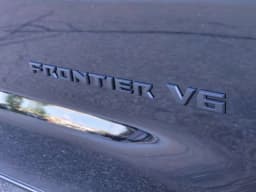 Nissan Frontier PRO-4X Crew Cab 4x4 2027 — side view