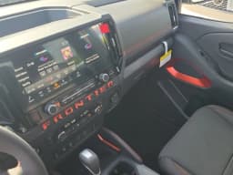 Nissan Frontier PRO-4X Crew Cab 4x4 2026 — side view