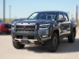 Nissan Frontier PRO-4X Crew Cab 4x4 2027 — side view