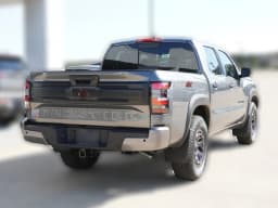 Nissan Frontier PRO-4X Crew Cab 4x4 2027 — side view
