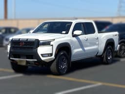 Nissan Frontier PRO-4X Crew Cab 4x4 Long Bed 2026 — side view