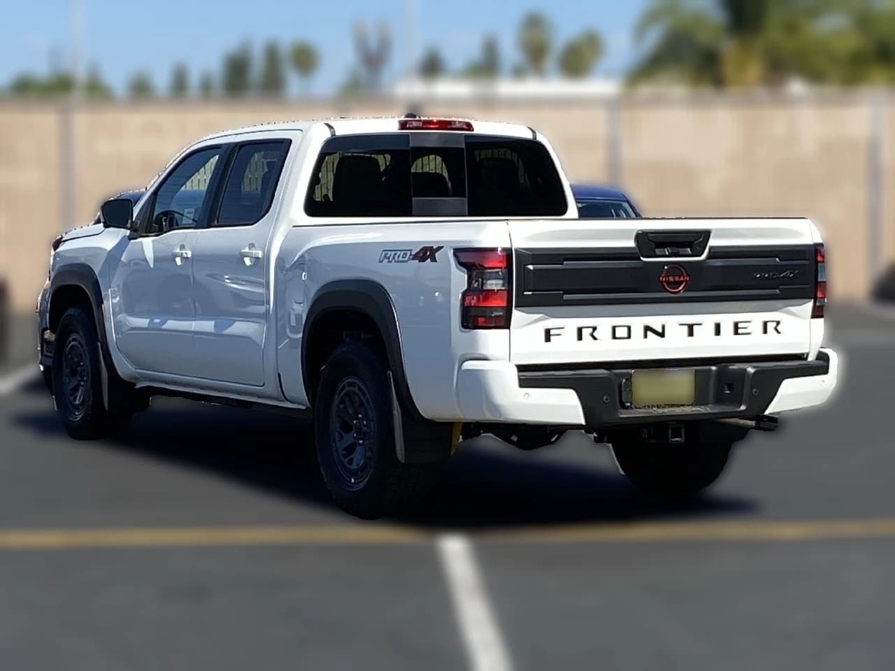 Nissan Frontier PRO-4X Crew Cab 4x4 Long Bed 2026 — side view