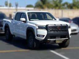Nissan Frontier PRO-4X Crew Cab 4x4 Long Bed 2026 — side view