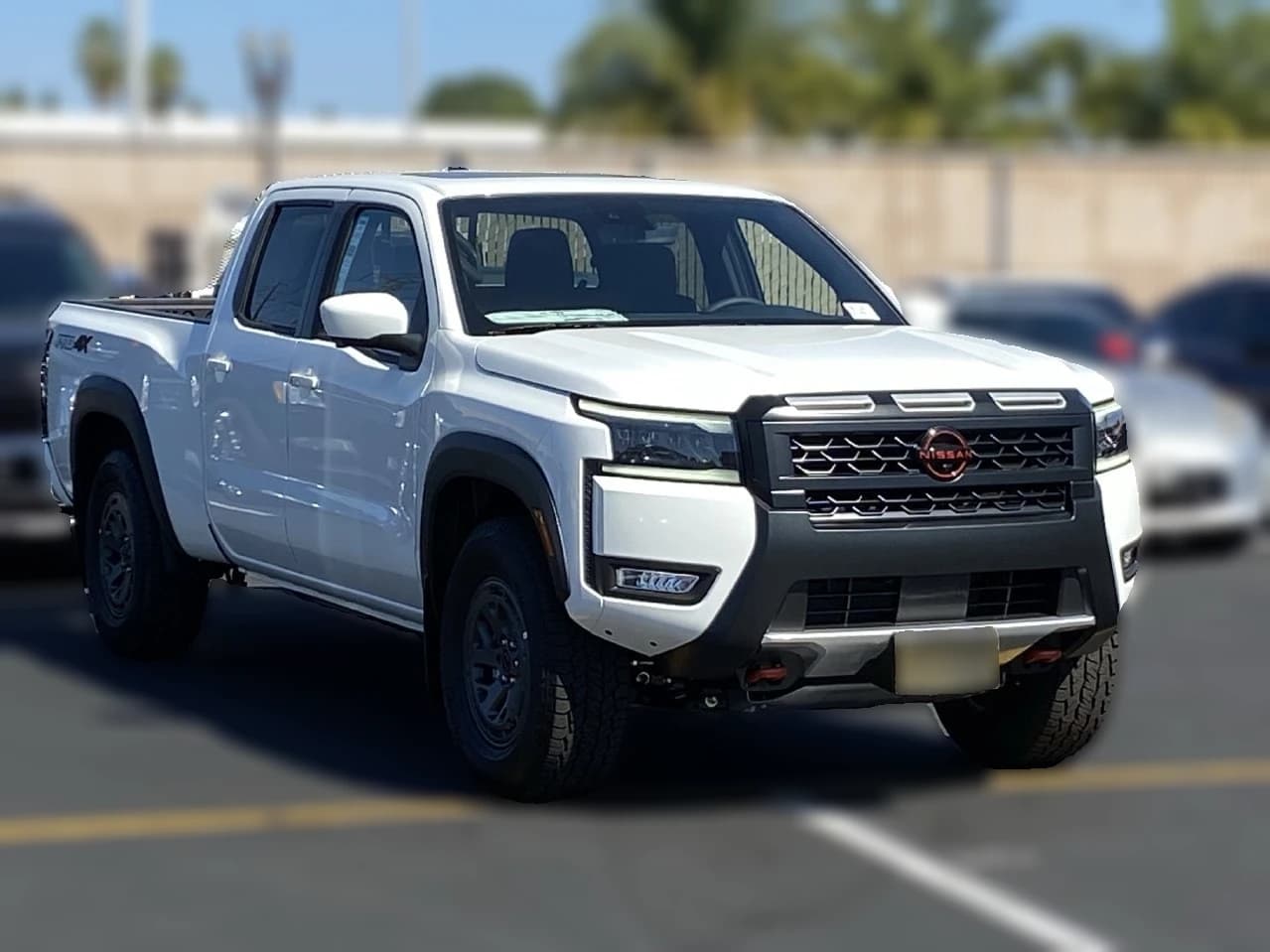 Nissan Frontier PRO-4X Crew Cab 4x4 Long Bed 2026 — side view