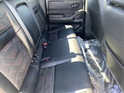 Nissan Frontier PRO-4X Crew Cab 4x4 Long Bed 2026 — side view