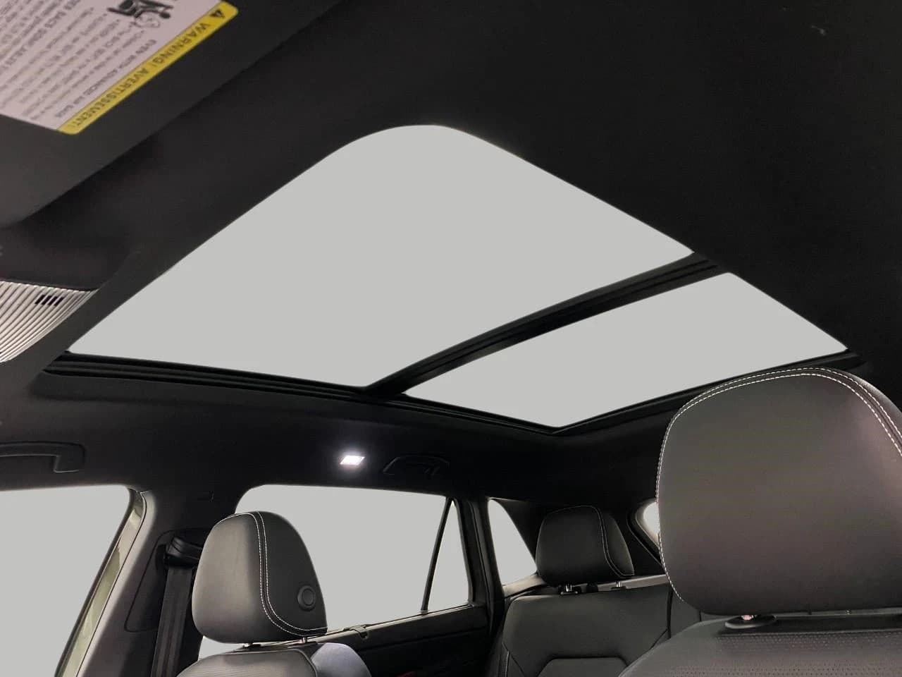Volkswagen Atlas Cross Sport 2.0T SEL R-Line Black 4MOTION 2026 — side view