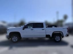 Chevrolet Silverado 2500HD Work Truck 4WD Crew Cab 159" 2026 — side view