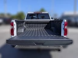 Chevrolet Silverado 2500HD Work Truck 4WD Crew Cab 159" 2026 — side view