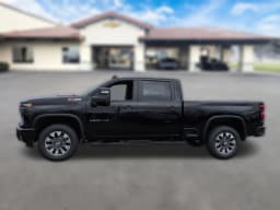 Chevrolet Silverado 2500HD Custom 4WD Crew Cab 159" 2026 — side view
