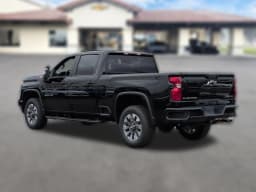Chevrolet Silverado 2500HD Custom 4WD Crew Cab 159" 2026 — side view