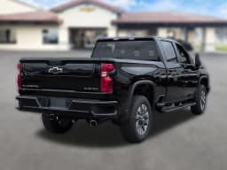 Chevrolet Silverado 2500HD Custom 4WD Crew Cab 159" 2026 — side view