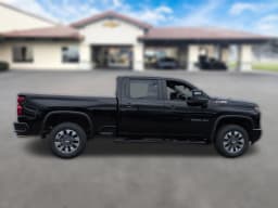 Chevrolet Silverado 2500HD Custom 4WD Crew Cab 159" 2026 — side view