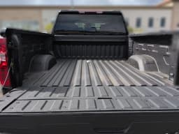 Chevrolet Silverado 2500HD Custom 4WD Crew Cab 159" 2026 — side view