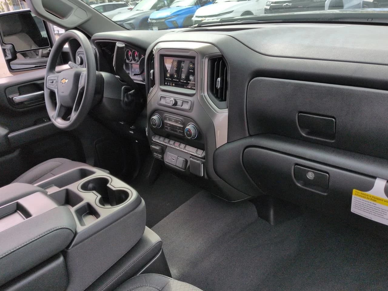Chevrolet Silverado 2500HD Custom 4WD Crew Cab 159" 2026 — side view