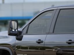 Chevrolet Silverado 2500HD Custom 4WD Crew Cab 159" 2026 — side view