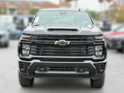 Chevrolet Silverado 2500HD Custom 4WD Crew Cab 159" 2026 — side view