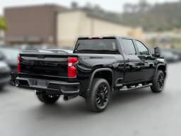 Chevrolet Silverado 2500HD Custom 4WD Crew Cab 159" 2026 — side view