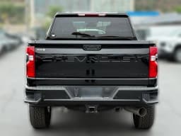 Chevrolet Silverado 2500HD Custom 4WD Crew Cab 159" 2026 — side view