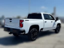 Chevrolet Silverado 2500HD LT 4WD Crew Cab 159" 2026 — side view