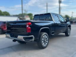 Chevrolet Silverado 2500HD LT 4WD Crew Cab 159" 2026 — side view