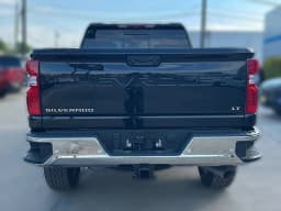 Chevrolet Silverado 2500HD LT 4WD Crew Cab 159" 2026 — side view