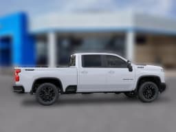 Chevrolet Silverado 2500HD LT 4WD Crew Cab 159" 2026 — side view