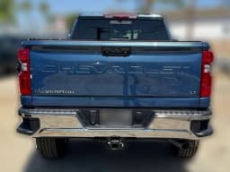 Chevrolet Silverado 2500HD LT 4WD Crew Cab 159" 2026 — side view