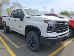 Chevrolet Silverado 2500HD LT 4WD Crew Cab 159" 2026 — side view