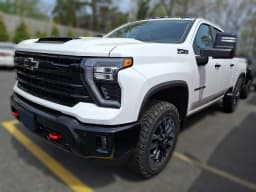 Chevrolet Silverado 2500HD LT 4WD Crew Cab 159" 2026 — side view