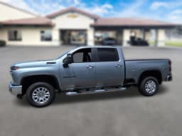 Chevrolet Silverado 2500HD LT 4WD Crew Cab 159" 2026 — side view