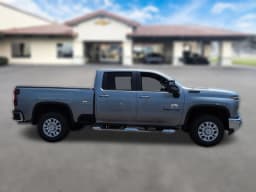 Chevrolet Silverado 2500HD LT 4WD Crew Cab 159" 2026 — side view