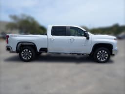 Chevrolet Silverado 2500HD LT 4WD Crew Cab 159" 2026 — side view