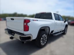 Chevrolet Silverado 2500HD LT 4WD Crew Cab 159" 2026 — side view