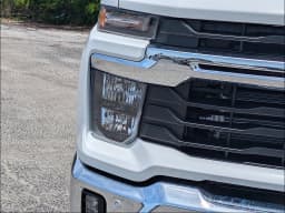 Chevrolet Silverado 2500HD LT 4WD Crew Cab 159" 2026 — side view