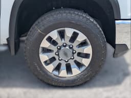 Chevrolet Silverado 2500HD LT 4WD Crew Cab 159" 2026 — side view