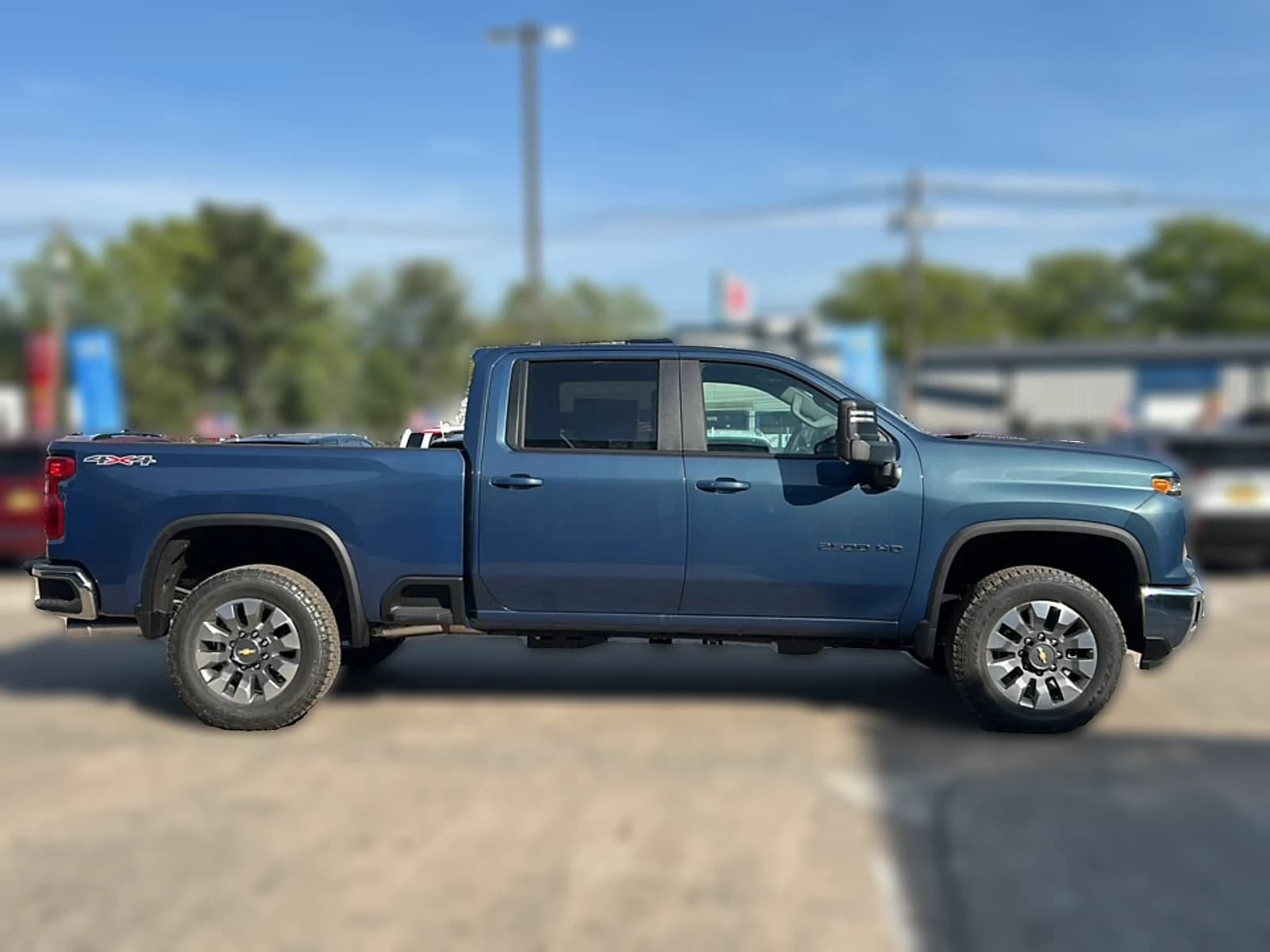 Chevrolet Silverado 2500HD LT 4WD Crew Cab 159" 2026 — side view