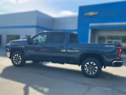 Chevrolet Silverado 2500HD LT 4WD Crew Cab 159" 2026 — side view