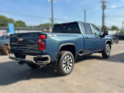 Chevrolet Silverado 2500HD LT 4WD Crew Cab 159" 2026 — side view