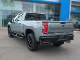 Chevrolet Silverado 2500HD LT 4WD Crew Cab 159" 2026 — side view