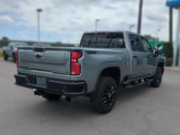Chevrolet Silverado 2500HD LT 4WD Crew Cab 159" 2026 — side view