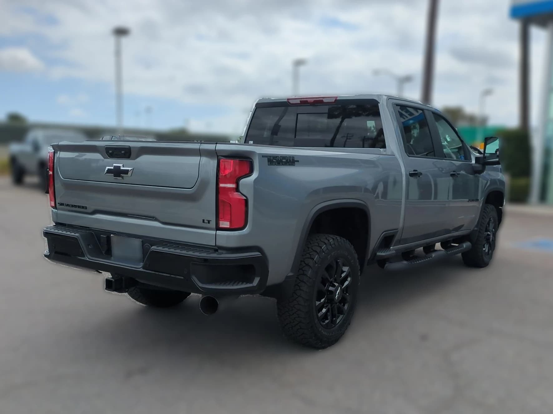 Chevrolet Silverado 2500HD LT 4WD Crew Cab 159" 2026 — side view