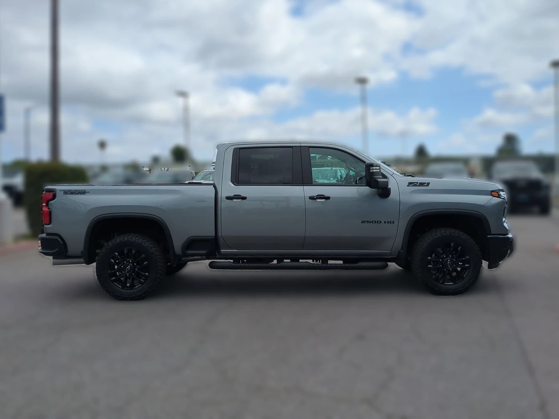Chevrolet Silverado 2500HD LT 4WD Crew Cab 159" 2026 — side view