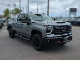 Chevrolet Silverado 2500HD LT 4WD Crew Cab 159" 2026 — side view