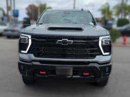 Chevrolet Silverado 2500HD LT 4WD Crew Cab 159" 2026 — side view