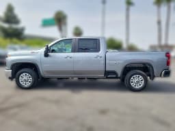 Chevrolet Silverado 2500HD LT 4WD Crew Cab 159" 2026 — side view