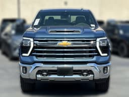 Chevrolet Silverado 2500HD LTZ 4WD Crew Cab 159" 2026 — side view