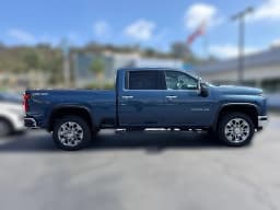 Chevrolet Silverado 2500HD LTZ 4WD Crew Cab 159" 2026 — side view