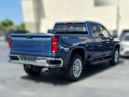 Chevrolet Silverado 2500HD LTZ 4WD Crew Cab 159" 2026 — side view