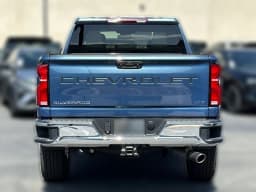 Chevrolet Silverado 2500HD LTZ 4WD Crew Cab 159" 2026 — side view