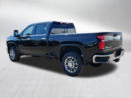 Chevrolet Silverado 3500HD LTZ 4WD Crew Cab 159" 2026 — side view